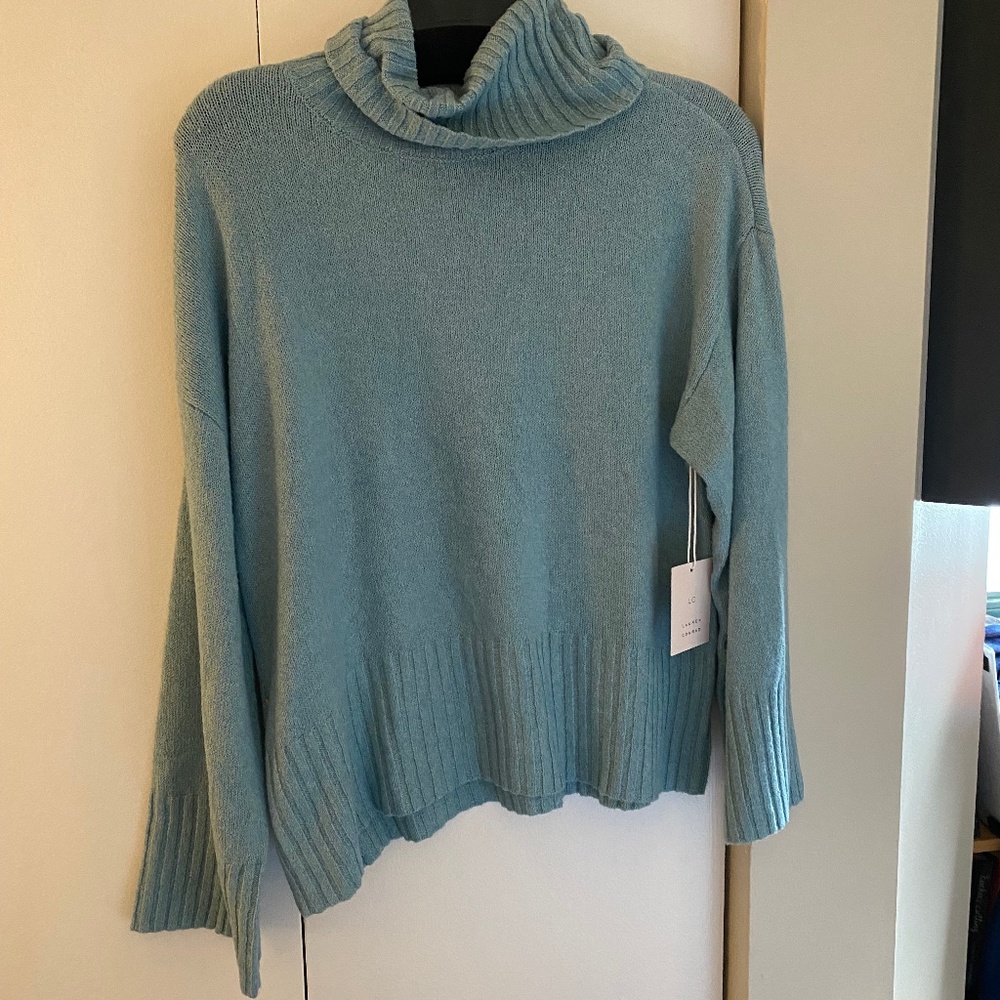 light blue turtleneck sweater